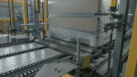 The work of the packaging machine for the production of glass-blowing products Stock Footage 147254830