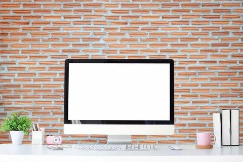 Work place with blank screen computer pc and office supplies on white table.. Stock Photos
