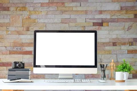 Work place with blank screen computer pc and office supplies on white table.. Stock Photos