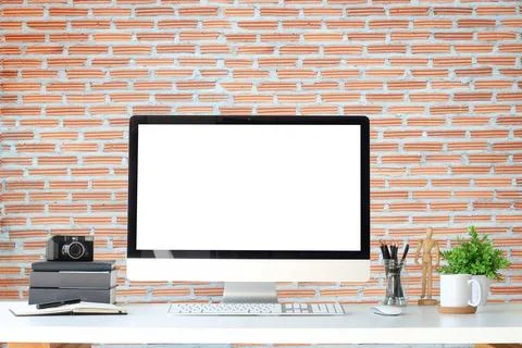 Work place with blank screen computer pc and office supplies on white table.. Stock Photos