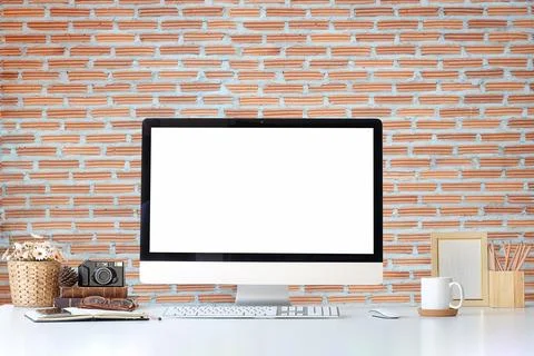 Work place with blank screen computer pc and office supplies on white table.. Stock Photos