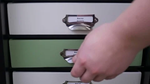 Work place of a jewelry designer, boxes with beads Stock Footage