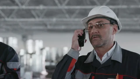 Work Plan of Machinery Engineer at Manufacture. Caucasian People in Hard Hat or Stock Footage 199475869