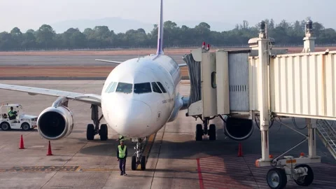 Work on the plane after its arrival at the Hat Yai International Airport (HDY) Stock Footage 269306176