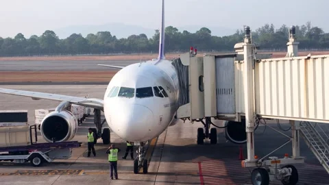 Work on the plane after its arrival at the Hat Yai International Airport Stock Footage 270298946