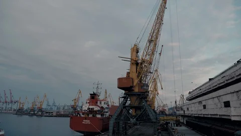 Work in the port. Port workers work hard Stock Footage 106626154