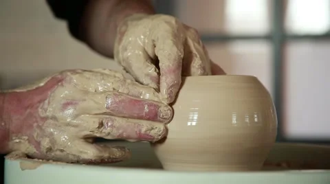 The work of the potter on potter's wheel Stock Footage 65186049
