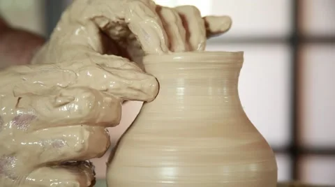 The work of the potter on potter's wheel Stock Footage 65186360