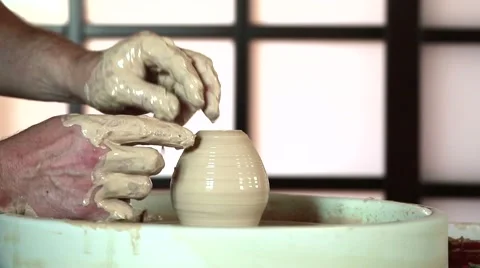 The work of the potter on potter's wheel Stock Footage 65186382