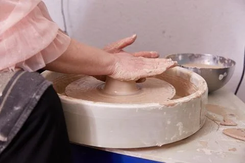 Work on the potter's wheel. bowl making. Stock Photos