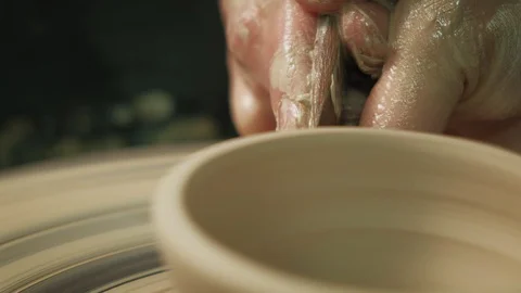 Work on the pottery wheel. making pottery Stock Footage 128215701