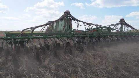 The work of a powerful, modern seeding complex in the field. Close-up Stock Footage 151496323