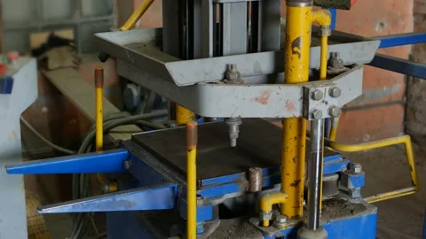 Work of press machine manufactured segmental pavers for road surface cover Stock Footage 95106712