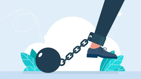 Work problem. Chain with a ball attached to a leg. The man's leg is chained Stock Footage 293095335