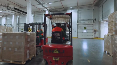 The work process of the forklift truck, the work processes in the warehouse 스톡 동영상 242043464