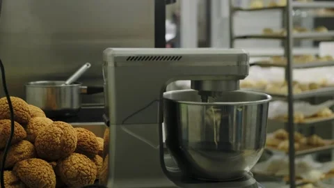 Work process in the kitchen, syrup is boiling in a saucepan on the stove. Stock Footage 267015172