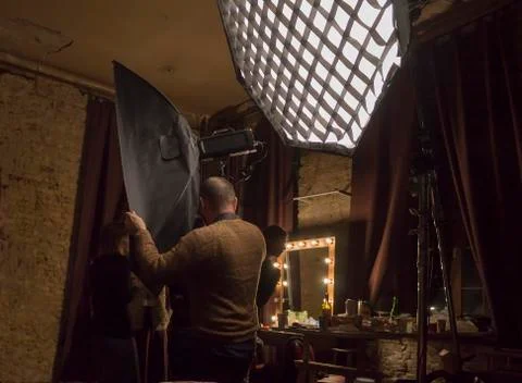 Work process of the photographer in studio Foto stock