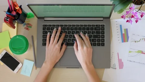 Work process of the project manager with documents and typing on the laptop Stock Footage 88295189