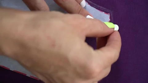 The work process of tailoring. Open the fabric. Business at home. Stock Footage 195535308