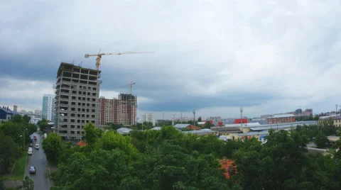 Work process tower cranes storm on background Video stock 68952861
