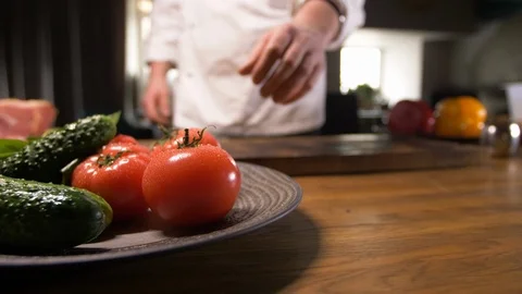 The work of a professional chef of a modern restaurant. Preparation of fresh Stock Footage 88876532