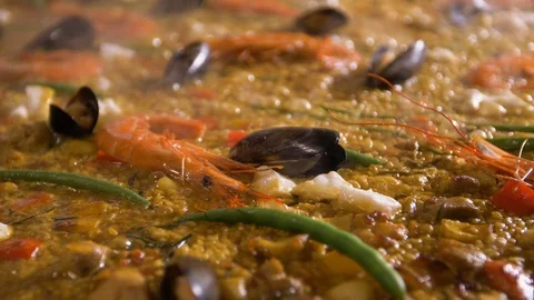 The work of a professional chef for the preparation of Spanish paella. Add the Video stock 89023223