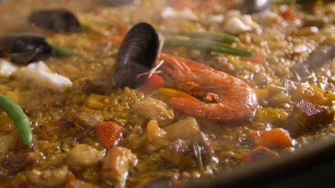 The work of a professional chef for the preparation of Spanish paella. Add the Video stock 89024439
