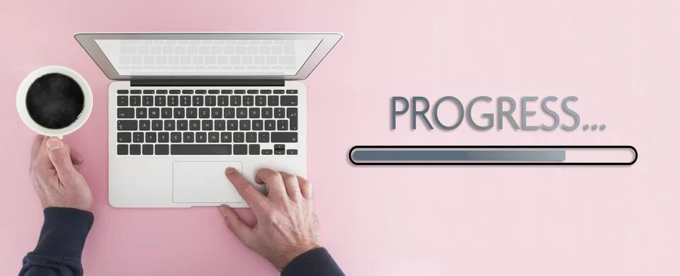 Work progress concept, above view of person working on laptop computer and Stock Photos