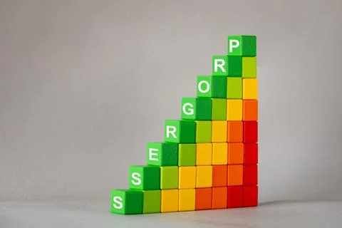 Work in progress concept. Graph trending upwards with word progress.  Foto stock