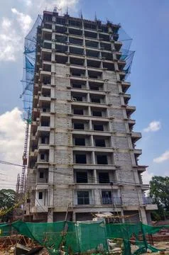 Work in progress of a narrow tall building. Foto stock