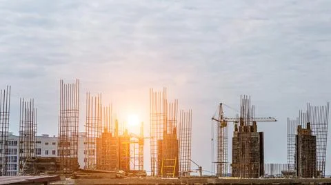 Work in progress on a new apartment block. Tall building under construction w Stock Photos
