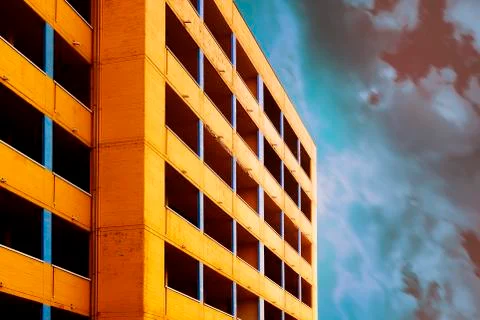 Work in progress yellow building with super sky 写真素材