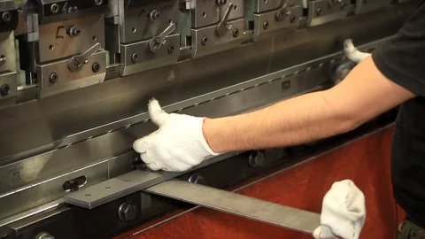 Work puts the item under the press. Creation of new parts under pressure at the Stock Footage 95007843