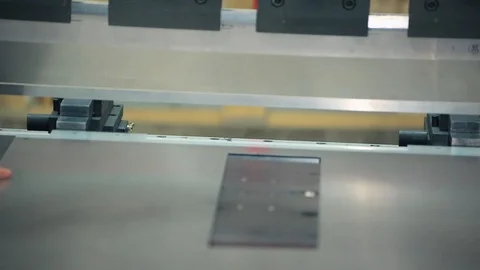 Work puts the item under the press. Creation of new parts under pressure at the Stock Footage 95007884