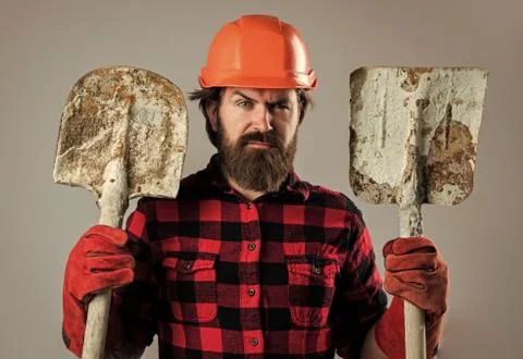 Work for real men. professional architect hold shovel in gloves. repair and Foto stock