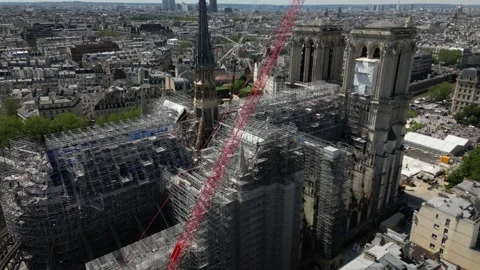 Work reconstruction progress at Notre Dame de Paris, France. Aerial drone Stock Footage 279468310