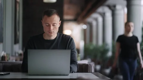 Work Remotely And Education Online, Portrait Of Adult Man With Laptop In Cafe Stock Footage 247973965
