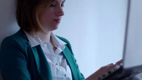 Work remotely - female manager works at home wearing jacket on pajamas Stock Footage 149264616