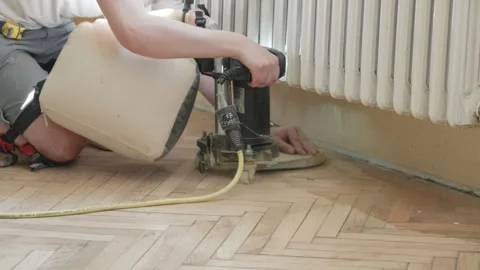 Work on restoring a large area of parquet floor in a public building Video stock 326419812