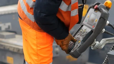 Work at road building. control panel on paver machine Stock Footage 127584061