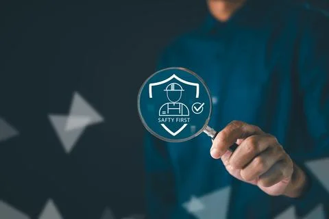 Work, safety, compliance, first, shield, workplace, health icon in magnifyi.. Stock Photos