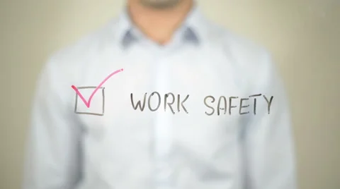 Work Safety,  Man writing on transparent screen Stock Footage 62981611