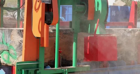 Work of the sawmill. Process of machining logs in equipment sawmill machine.. Stock Footage 284454484