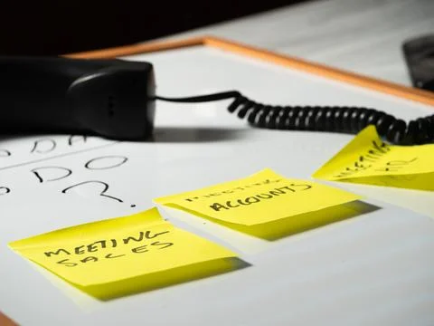 Work schedule with sticky notes on whiteboard Stock Photos