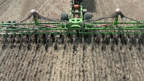 The work of the seeding complex in the field close-up. Aerial photography Видео 151496344
