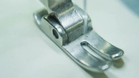 The work of the sewing machine in macro Stock Footage 63633090