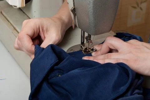 Work on the sewing machine Stock Photos