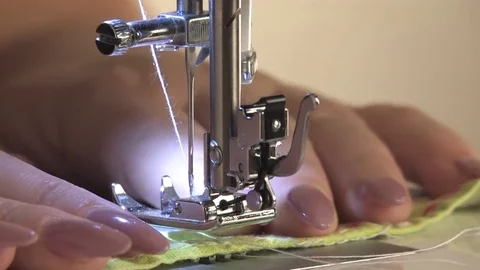 Work on the sewing machine, the seamstress sews the stitching Stock Footage 81087873