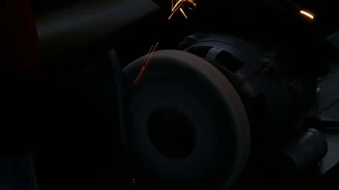 Work on a sharpening machine. In evening time Red sparks fly Video stock 78154632