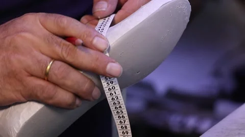 Work with shoes form  close-up Stock Footage 327400190